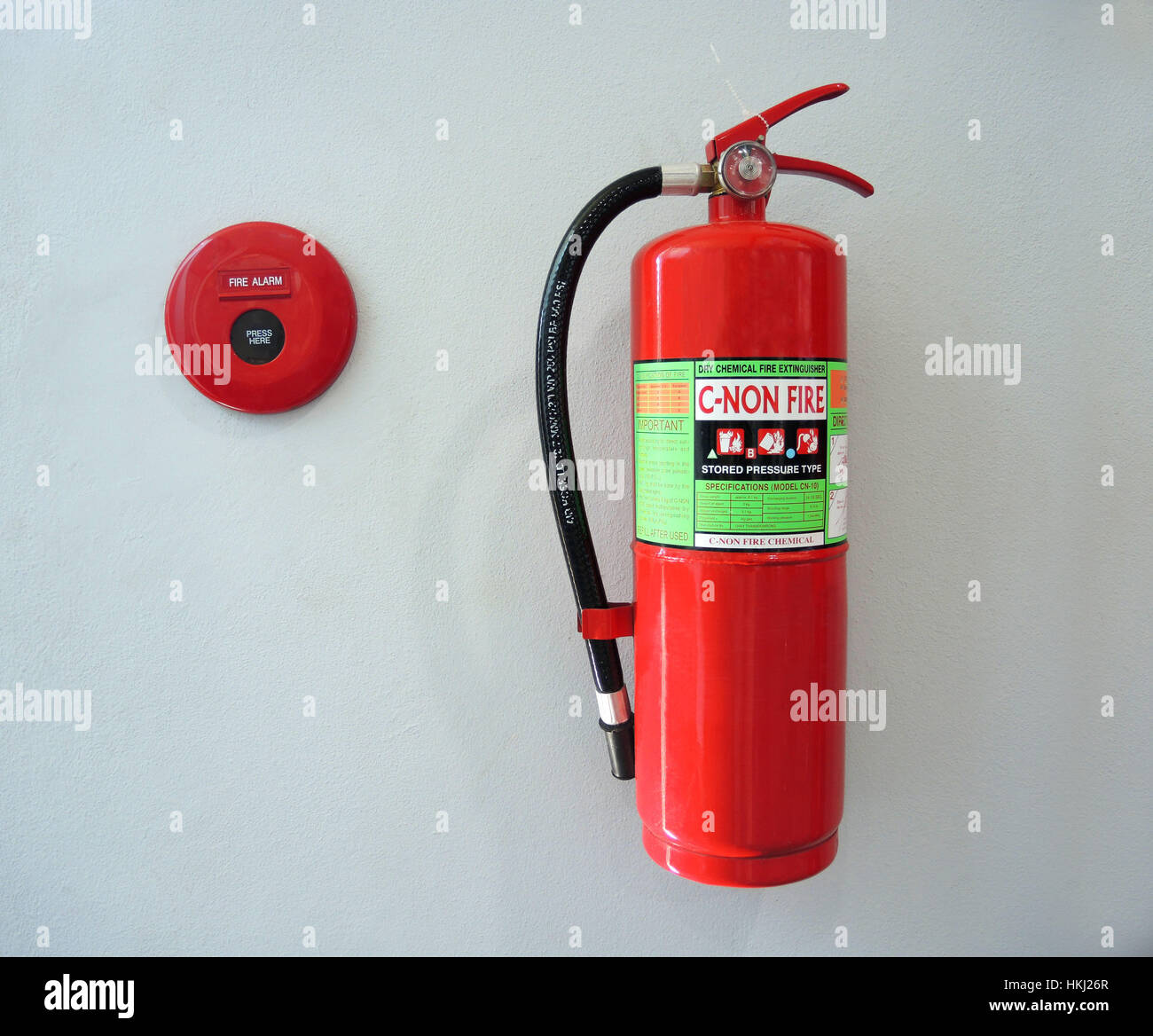 fire alarm and fire extinguisher on the wall Stock Photo Alamy