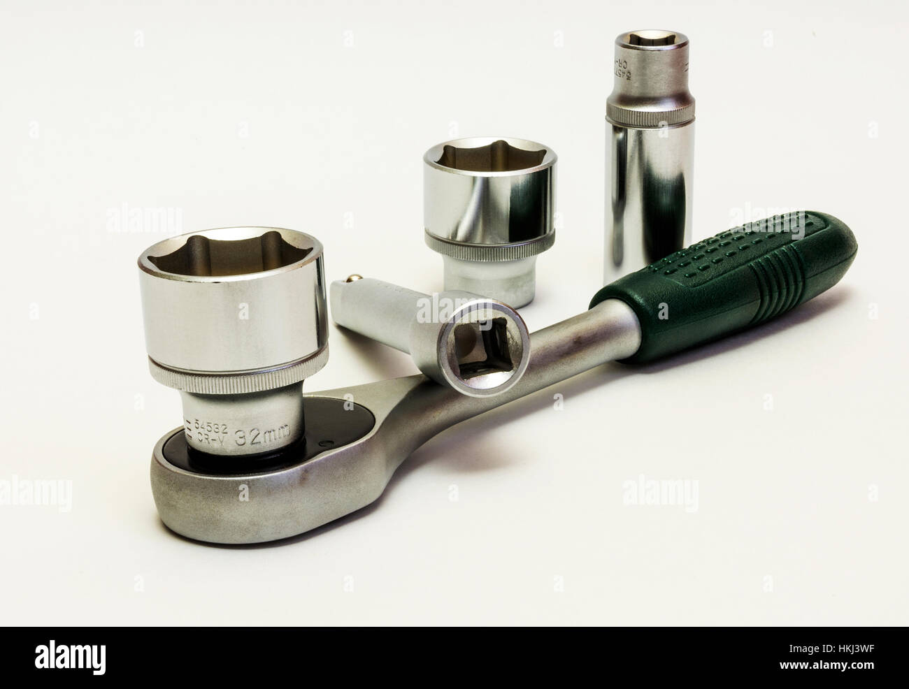 On a white background is the key, ratchet with extension and various