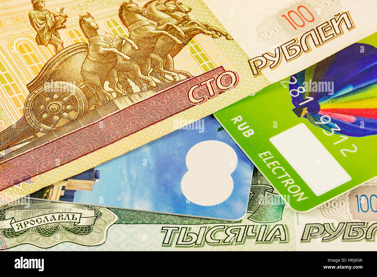 Part of the bank card cashless payment system and a part of Russian rubles banknotes Stock Photo