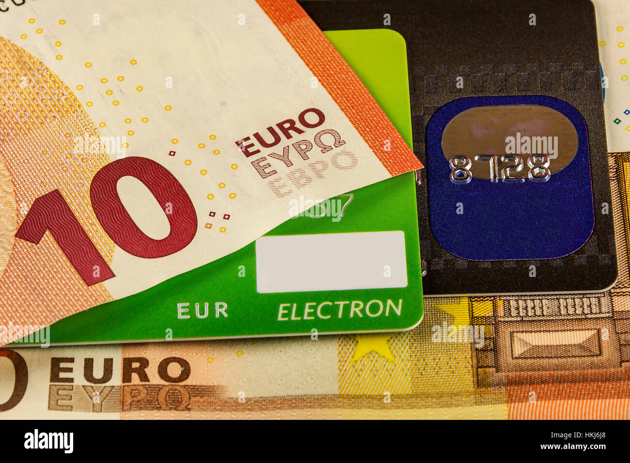 Part of the bank card cashless payment systems and parts of the euro banknotes Stock Photo