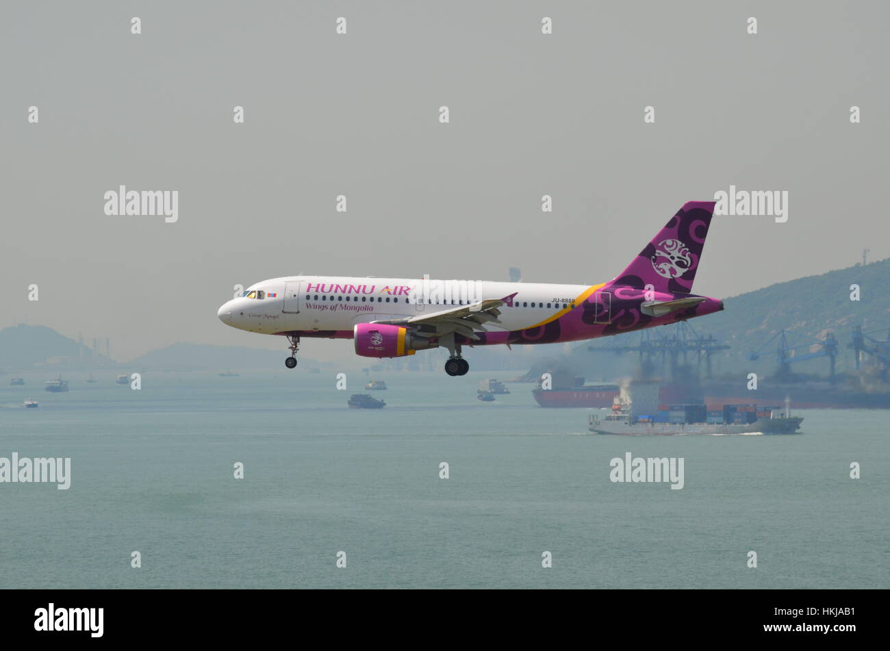 Hunnu Air Airbus A319 JU-8888 Great Mongol landing at Hong Kong International Airport Stock Photo