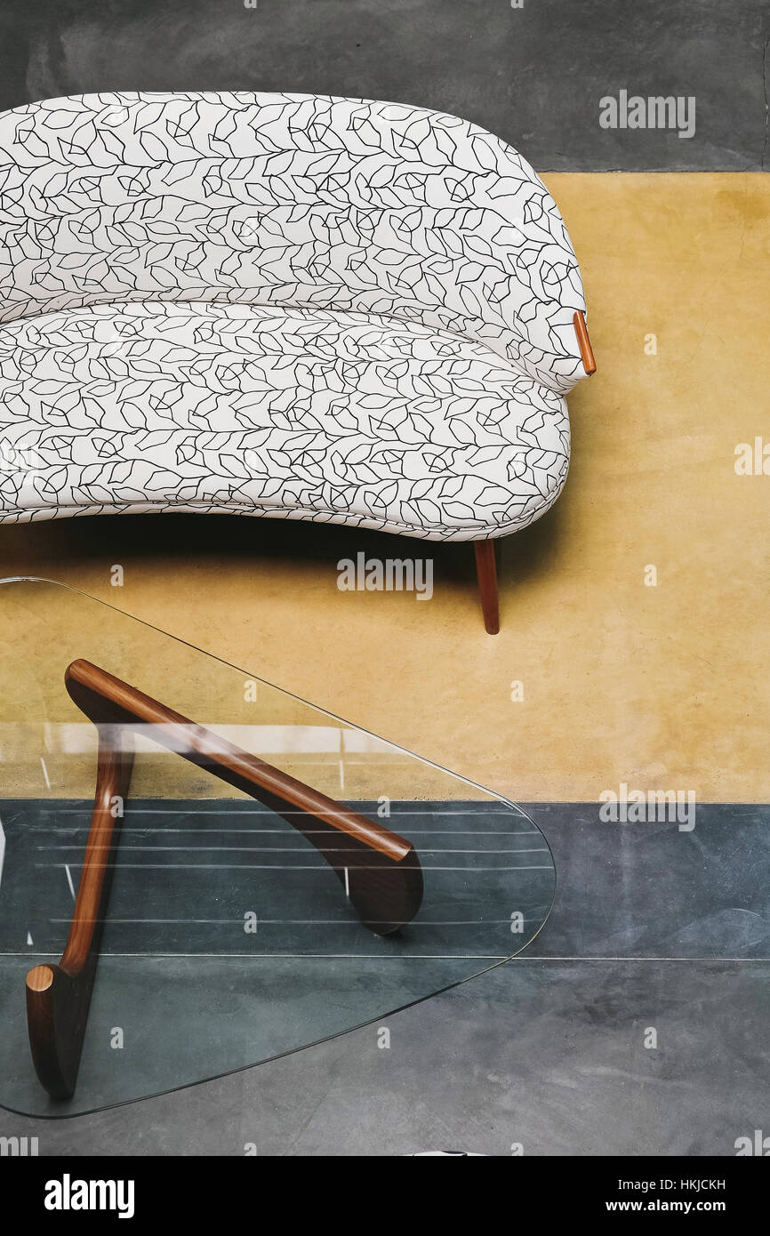 Living room with sofa and coffee table Stock Photo - Alamy