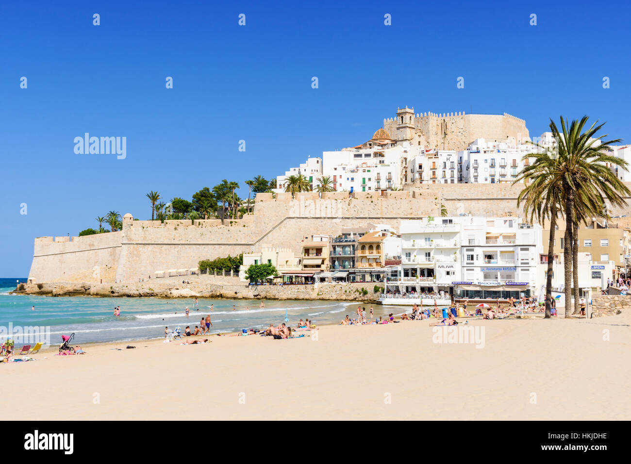 Peniscola's Papa Luna Castle and old town overlooking people enjoying the  sun on Playa Norte, Peniscola, Spain Stock Photo - Alamy