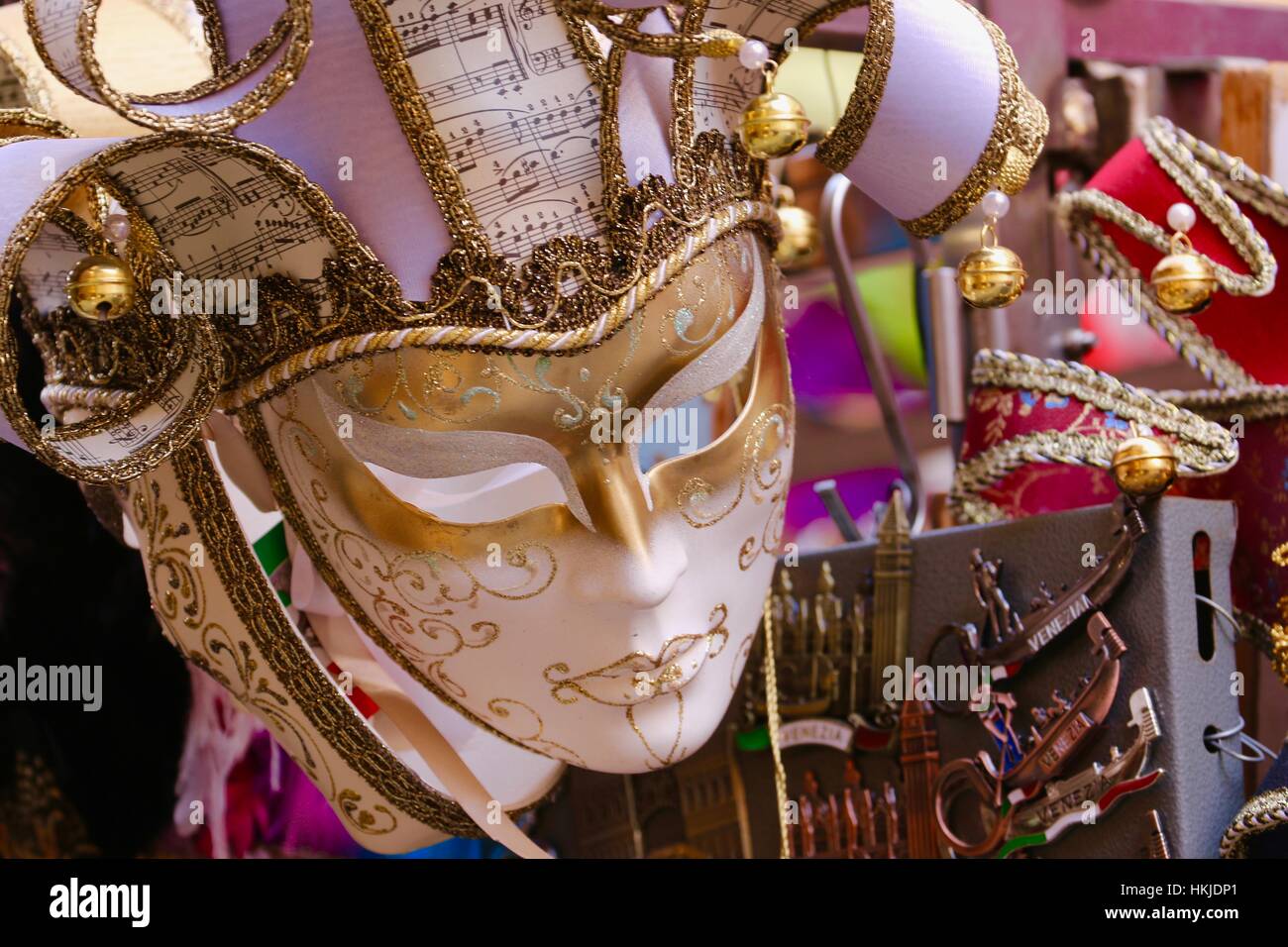 Venetian Masquerade ball masks on a market stall in Venice Italy Stock Photo