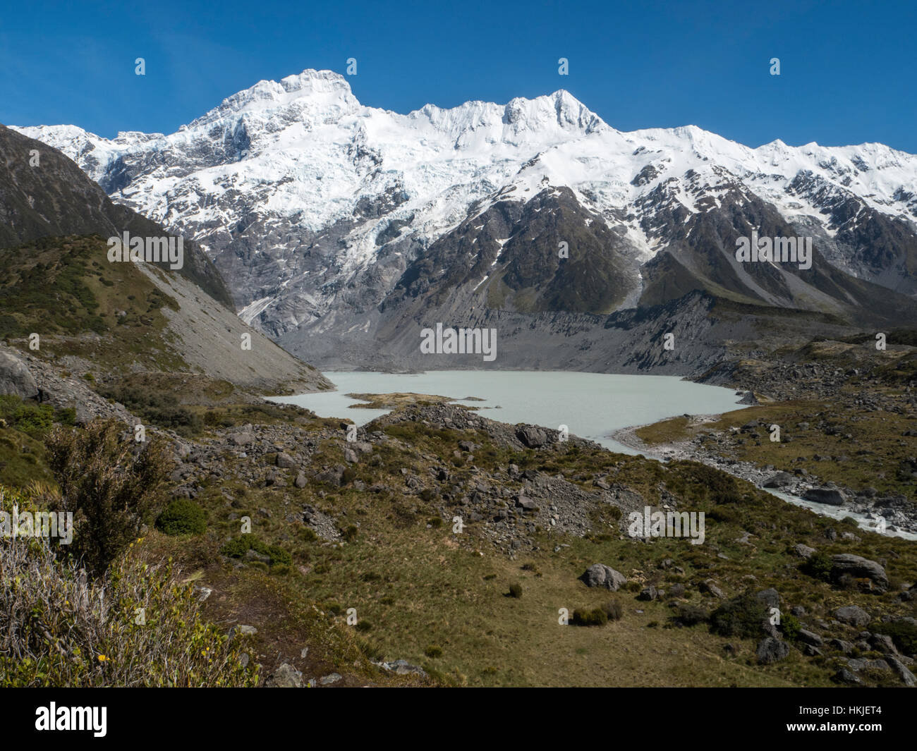 Mount Sefton, Glacial water flowing into the Hooker Valley Stock Photo