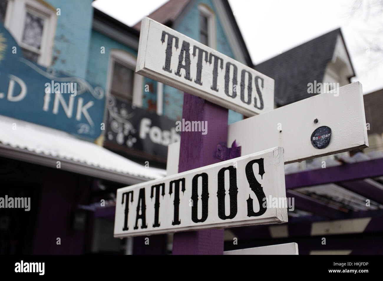 Tattoos and Piercings Sign, Kensington Market Area of Toronto 2016 Stock Photo