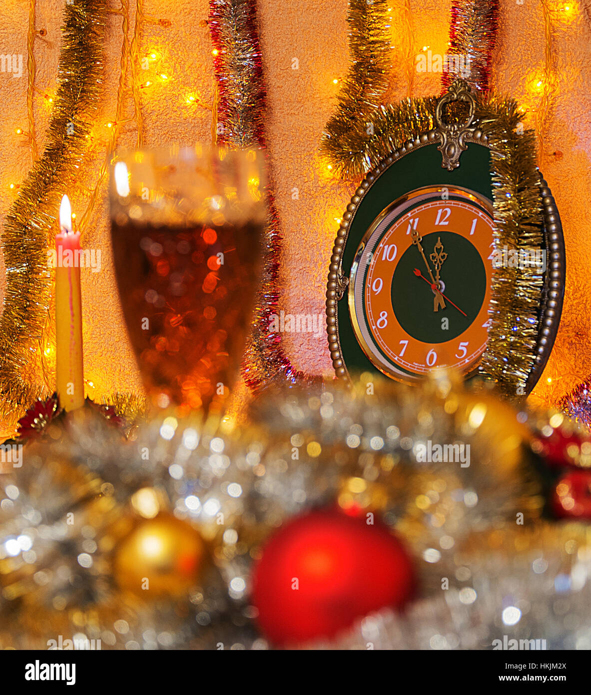 In the shadows are clearly visible clock which shows the time of five