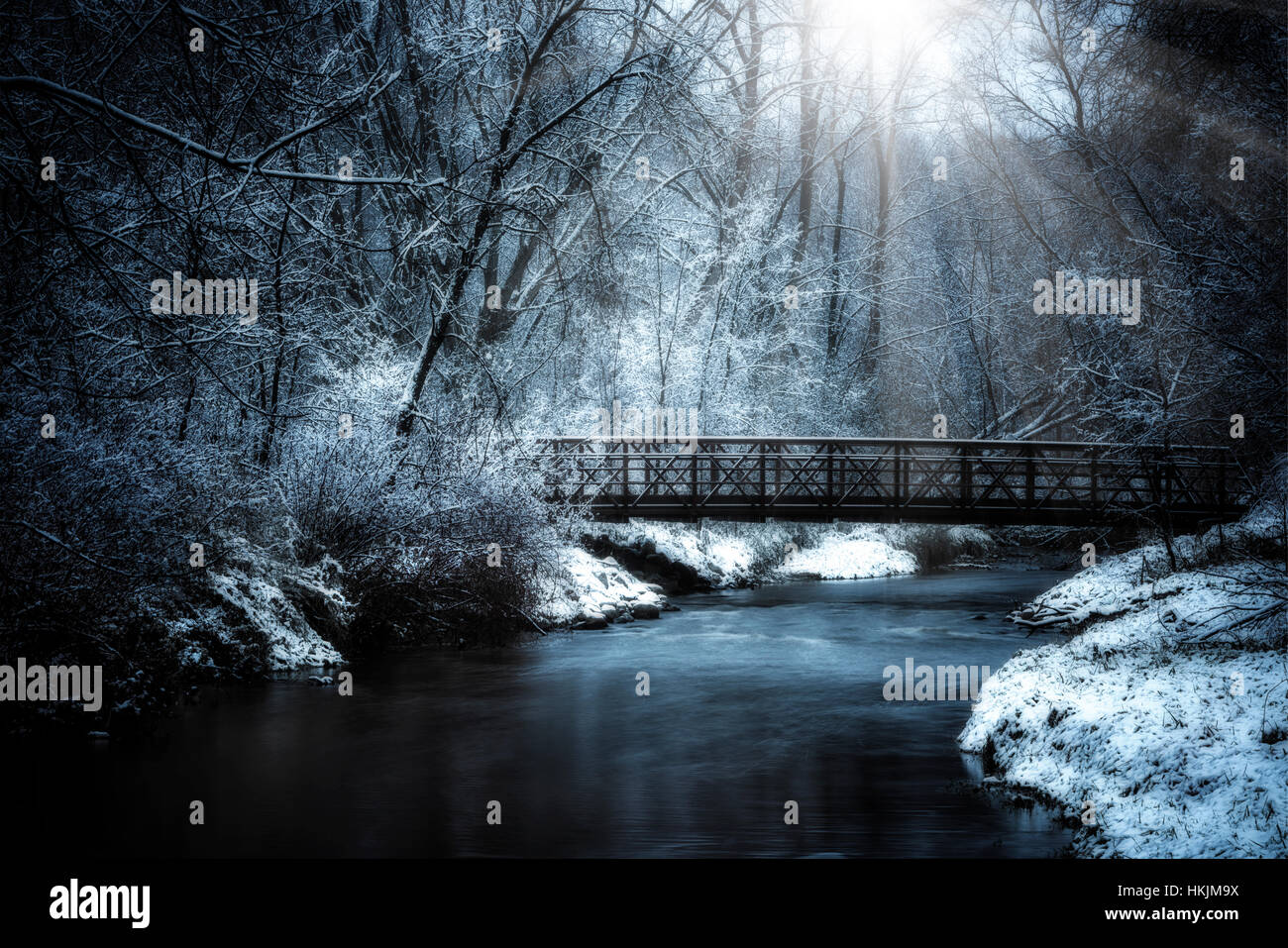 Bridge over Nine Mile Creek on a snowy winter morning. Stock Photo