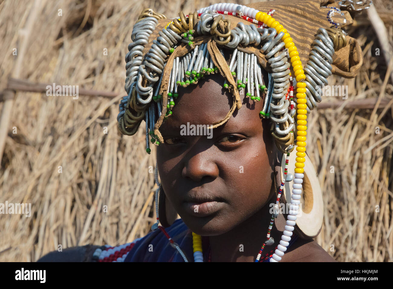 Mursi tribe people in traditional clothing, Mursi Village, South Omo, Ethiopia Stock Photo