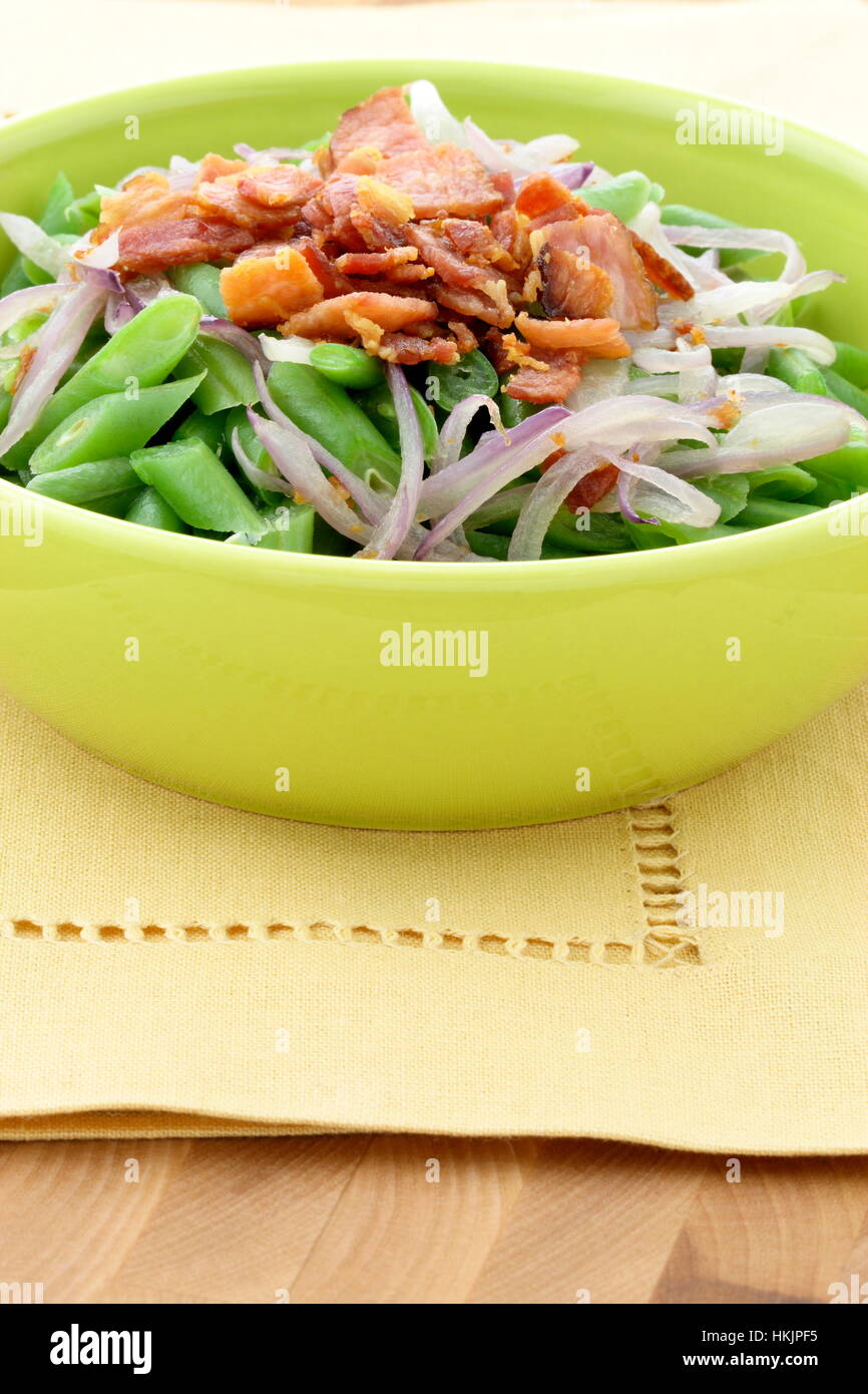 A holiday green bean casserole recipe, made with green beans, bacon or pancetta and sauteed