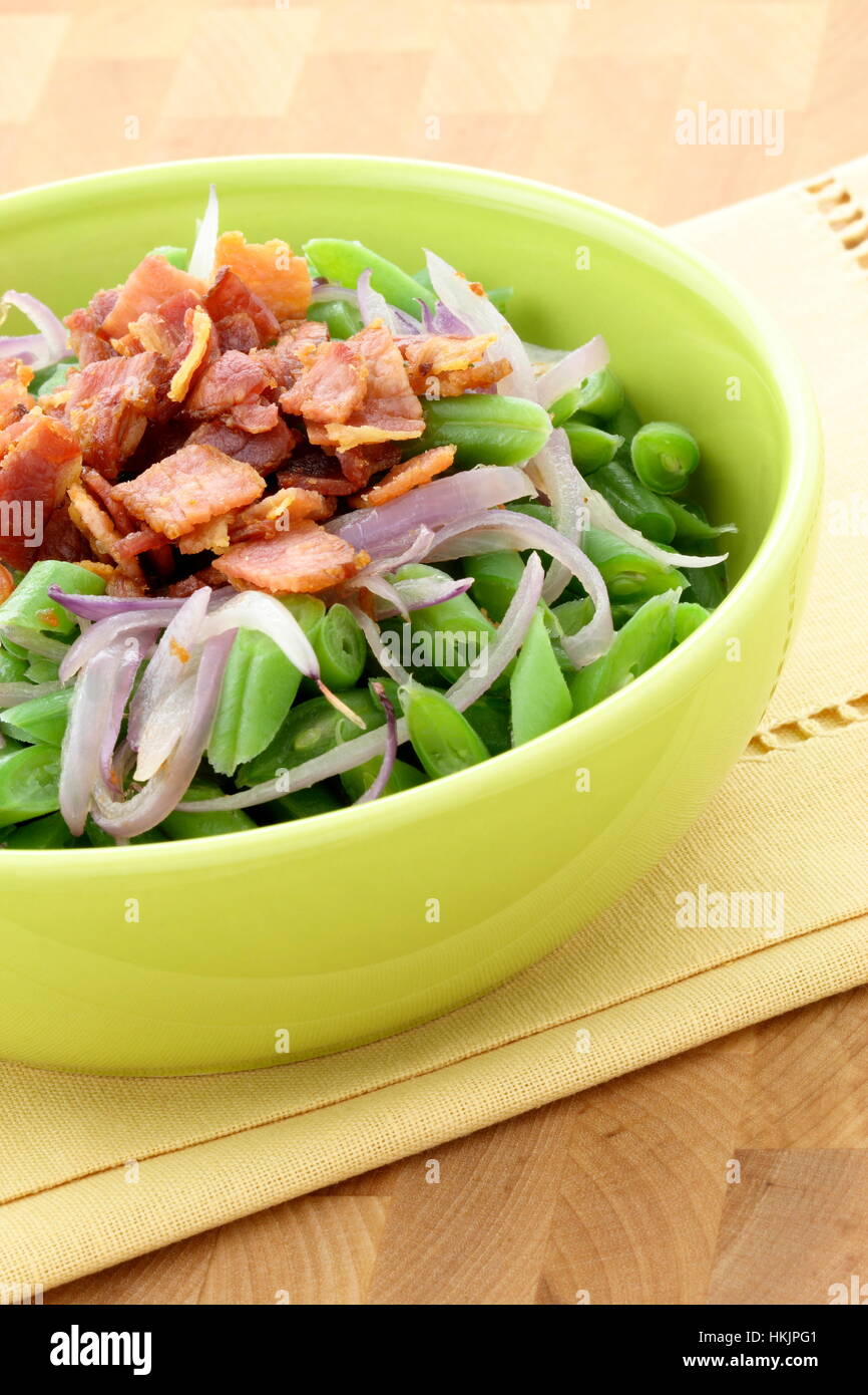 A holiday green bean casserole recipe, made with green beans, bacon or pancetta and sauteed