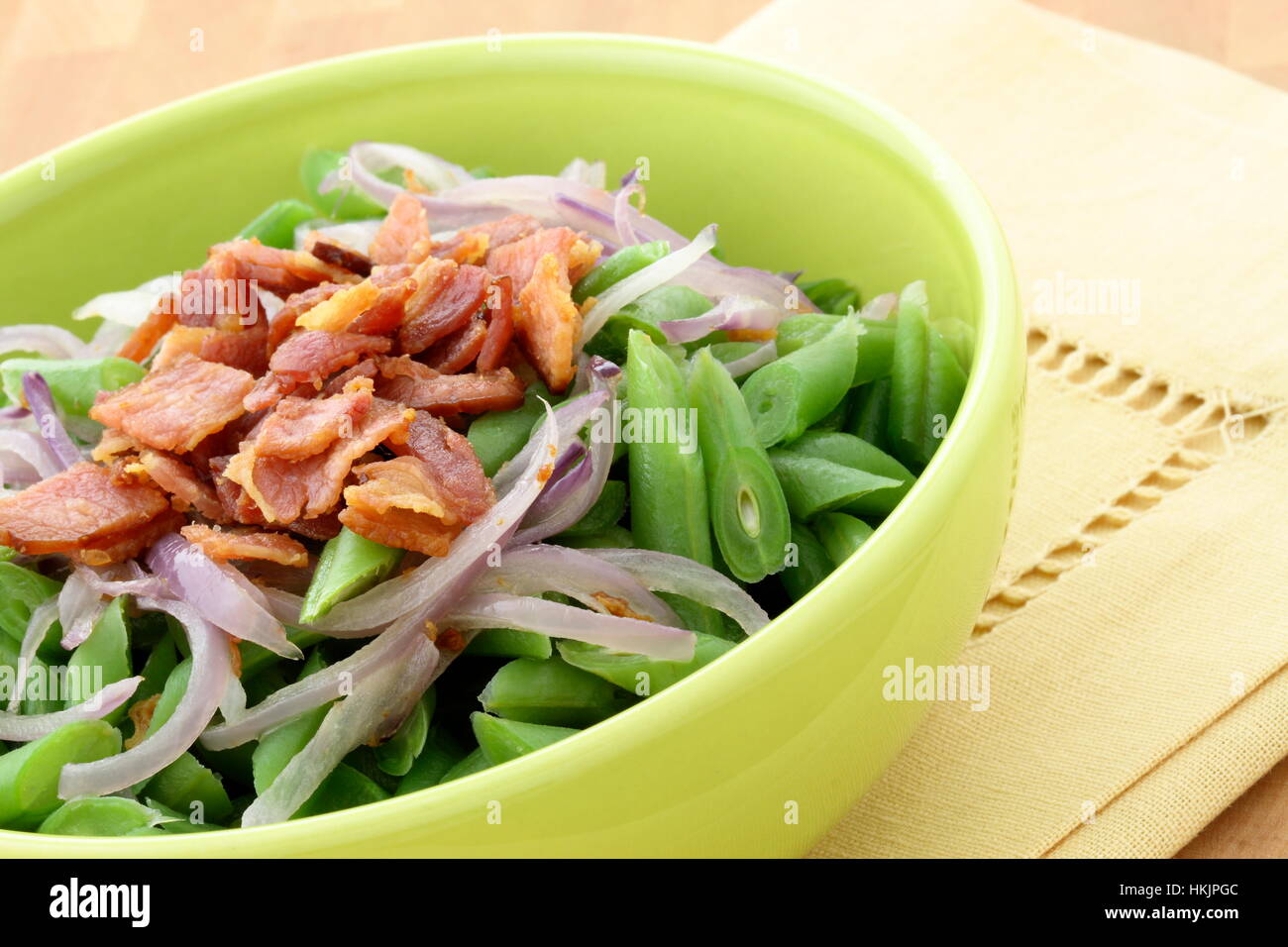 A holiday green bean casserole recipe, made with green beans, bacon or pancetta and sauteed