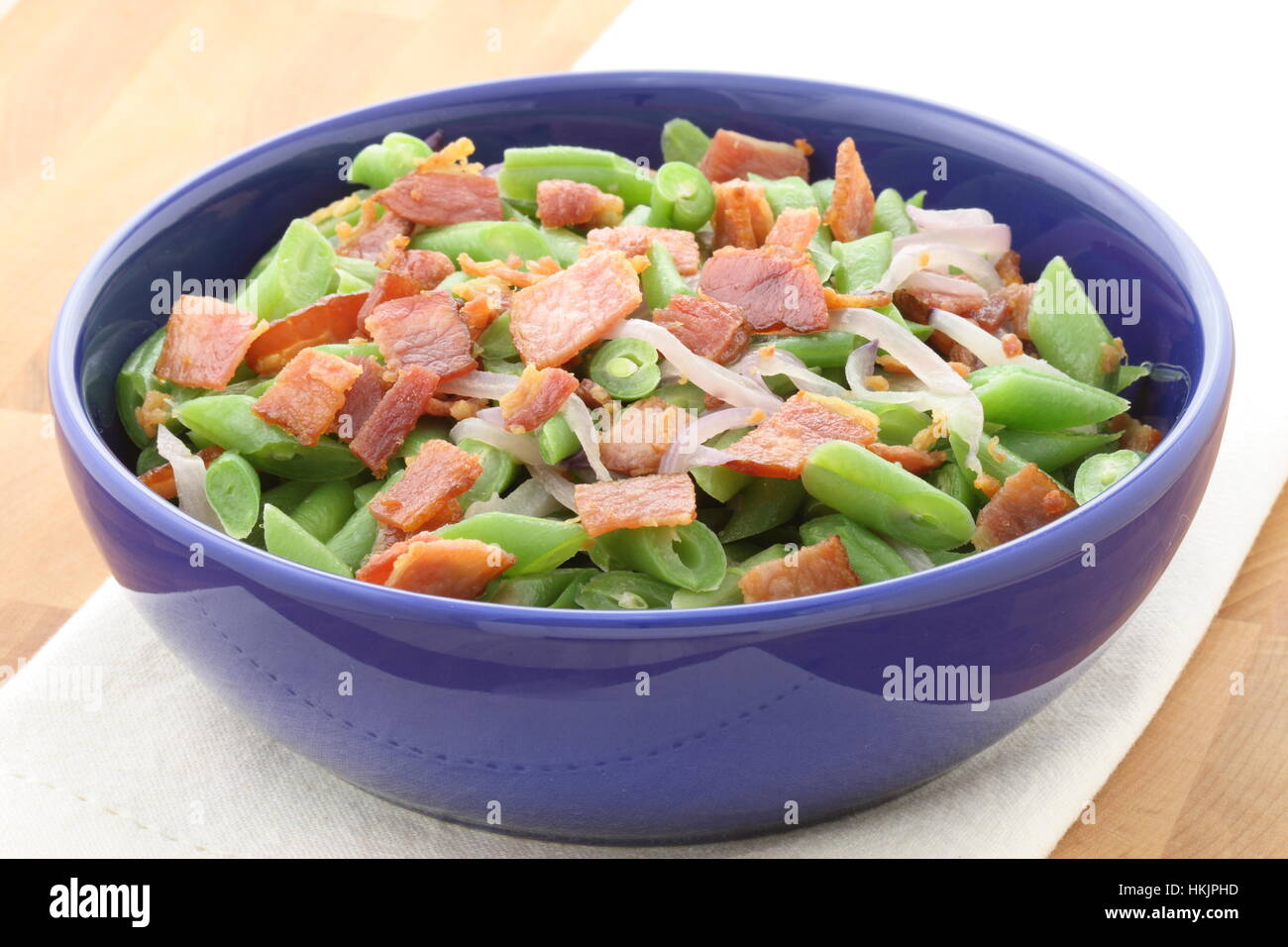 A holiday green bean casserole recipe, made with green beans, bacon or pancetta and sauteed