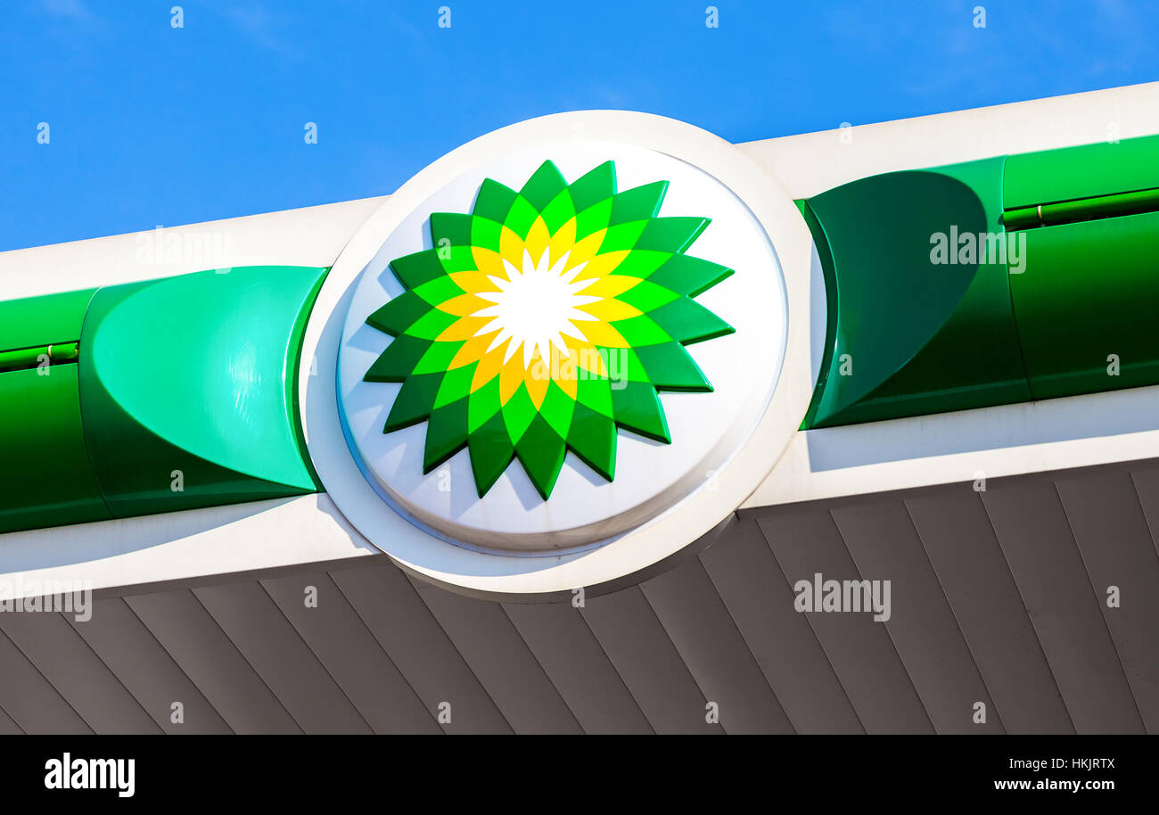 BP - British Petroleum petrol station logo over blue sky. British Petroleum is a British multinational oil and gas com Stock Photo