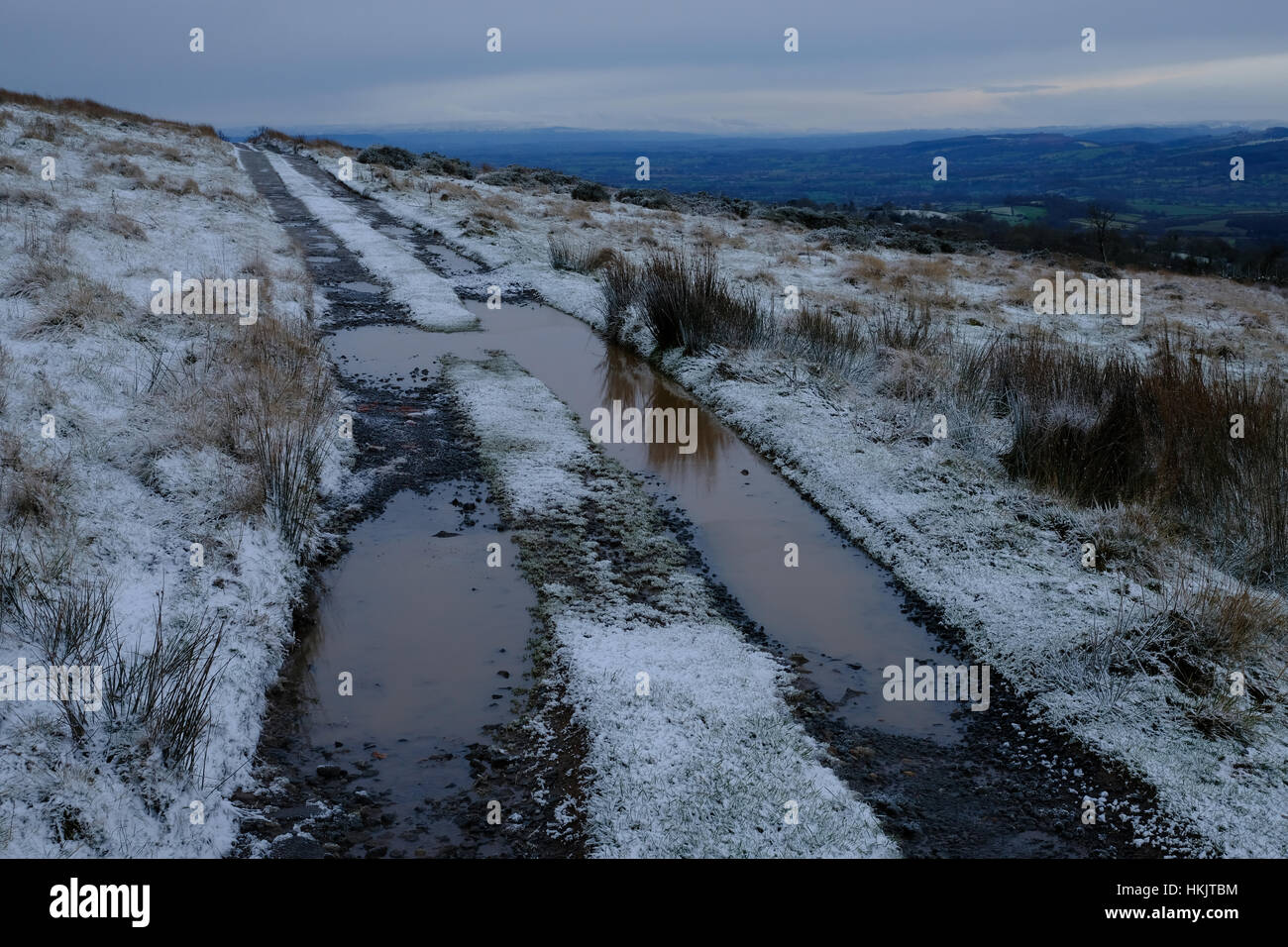 track across snow-covered moorland on Titterstone Clee Hill, Shropshire, UK Stock Photo