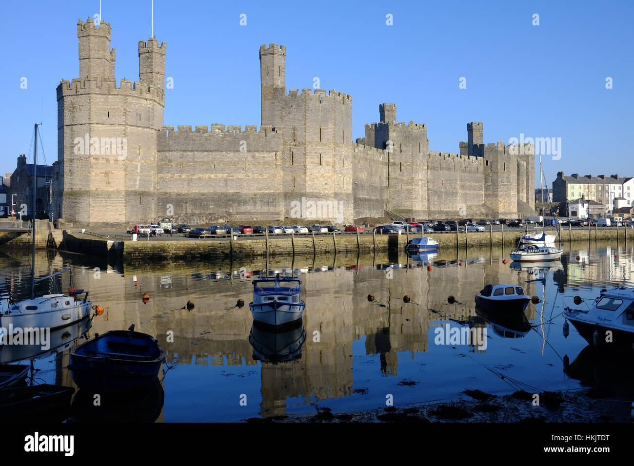 Caernarfon Castle in north Wales, viewed across the River Seiont Stock Photo