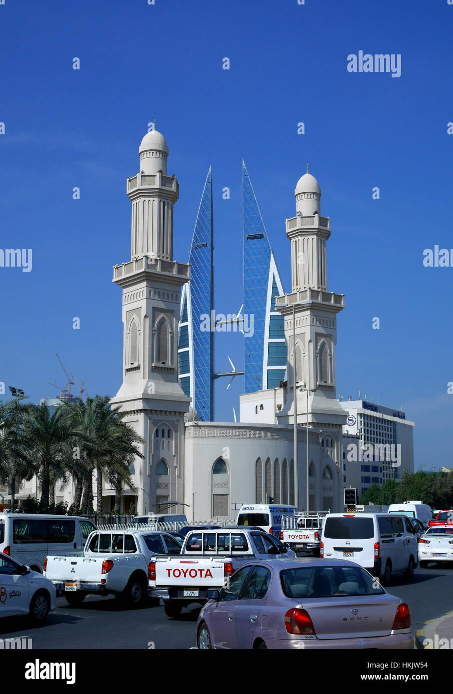 Ras Rumman Mosque with the World Trade Center towers behind, Bahrain Stock Photo