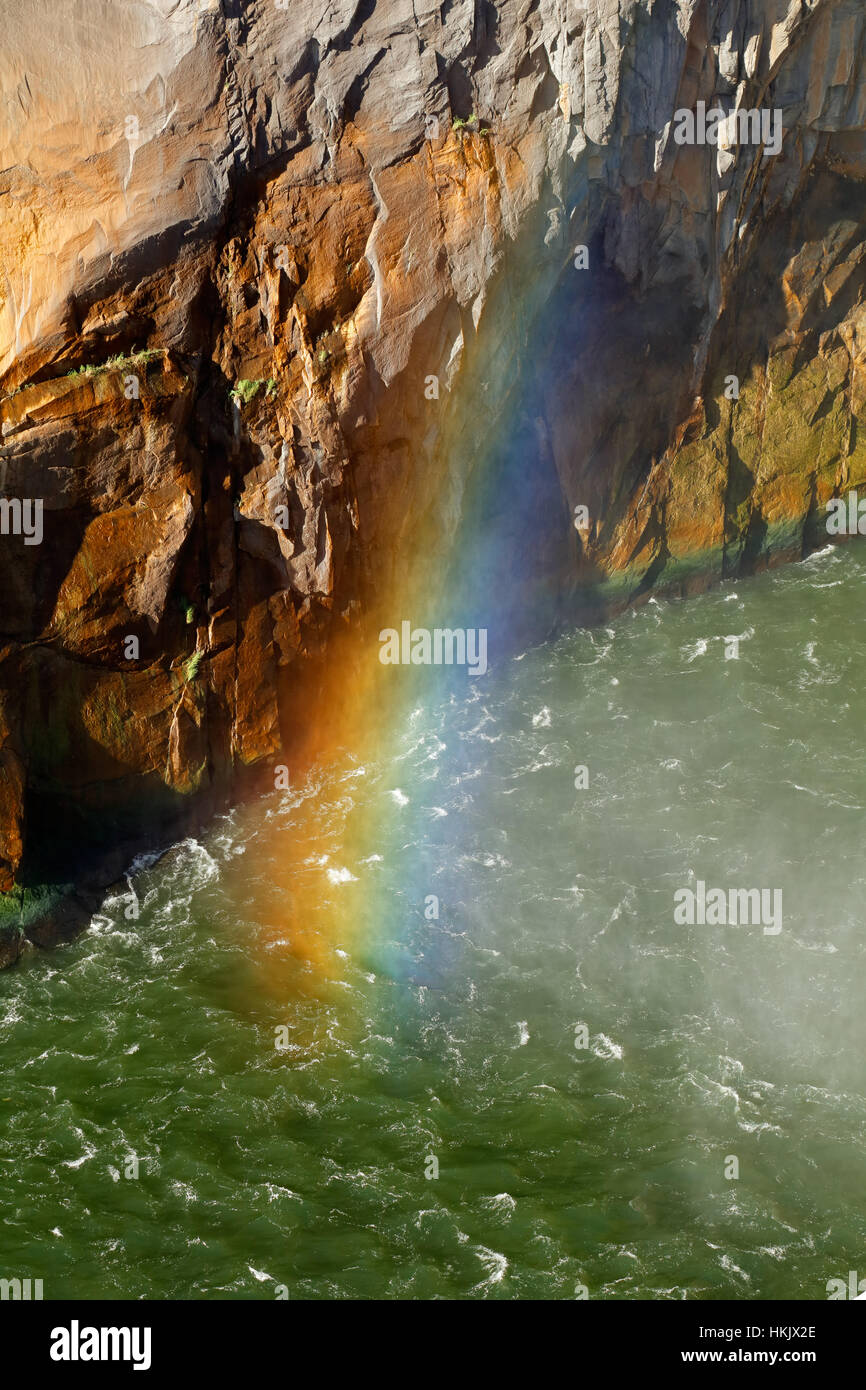 Rainbow in water spray,  Augrabies Falls National Park, South Africa Stock Photo