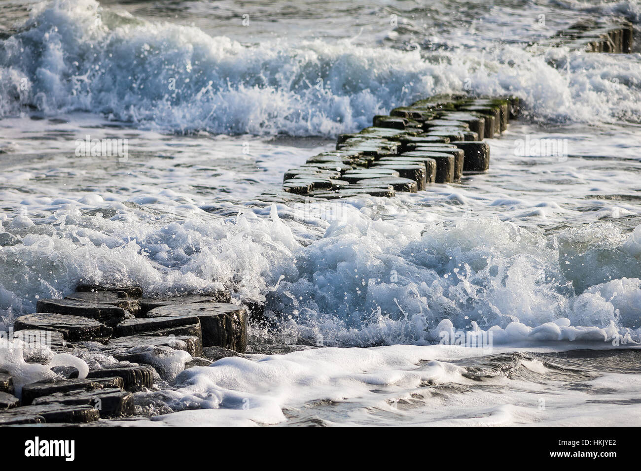 Groynes on shore of the Baltic Sea on a stormy day Stock Photo - Alamy