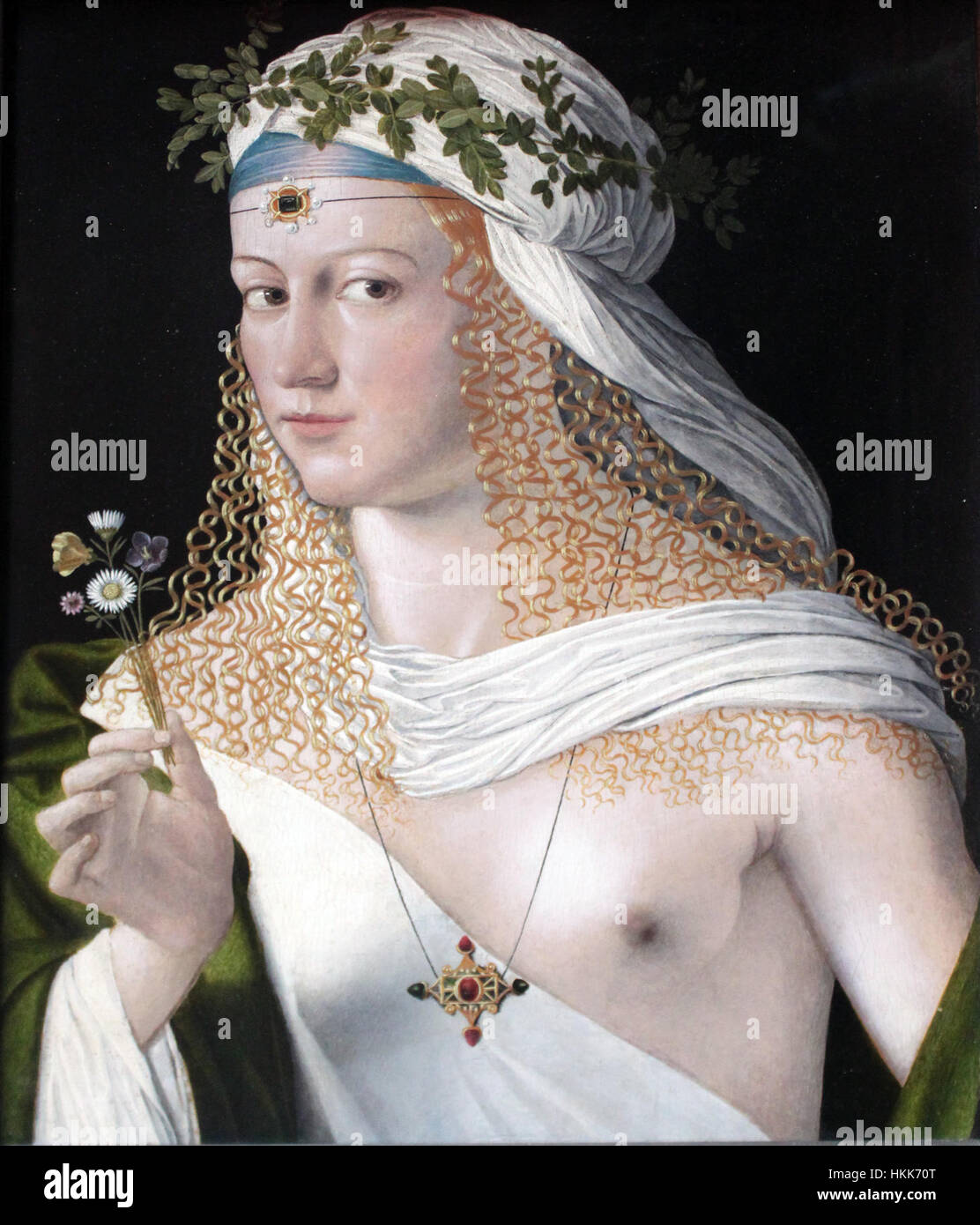 The *Idealbildnis einer Kurtisane als Flora* (1520) is a Renaissance painting depicting a courtesan portrayed as the Roman goddess Flora. The painting reflects the artistic trends of the period, blending mythological and humanist elements. Stock Photo