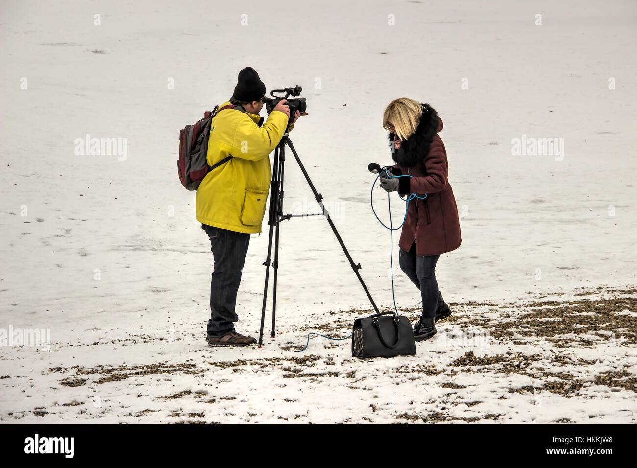 Belgrade, Serbia. 29th January 2017. Local television Studio-B news crew reporting from the shores of the frozen Sava Lake on a foggy Sunday morning at extremely low temperatures. Credit: Bratislav Stefanovic/Alamy Live News Stock Photo