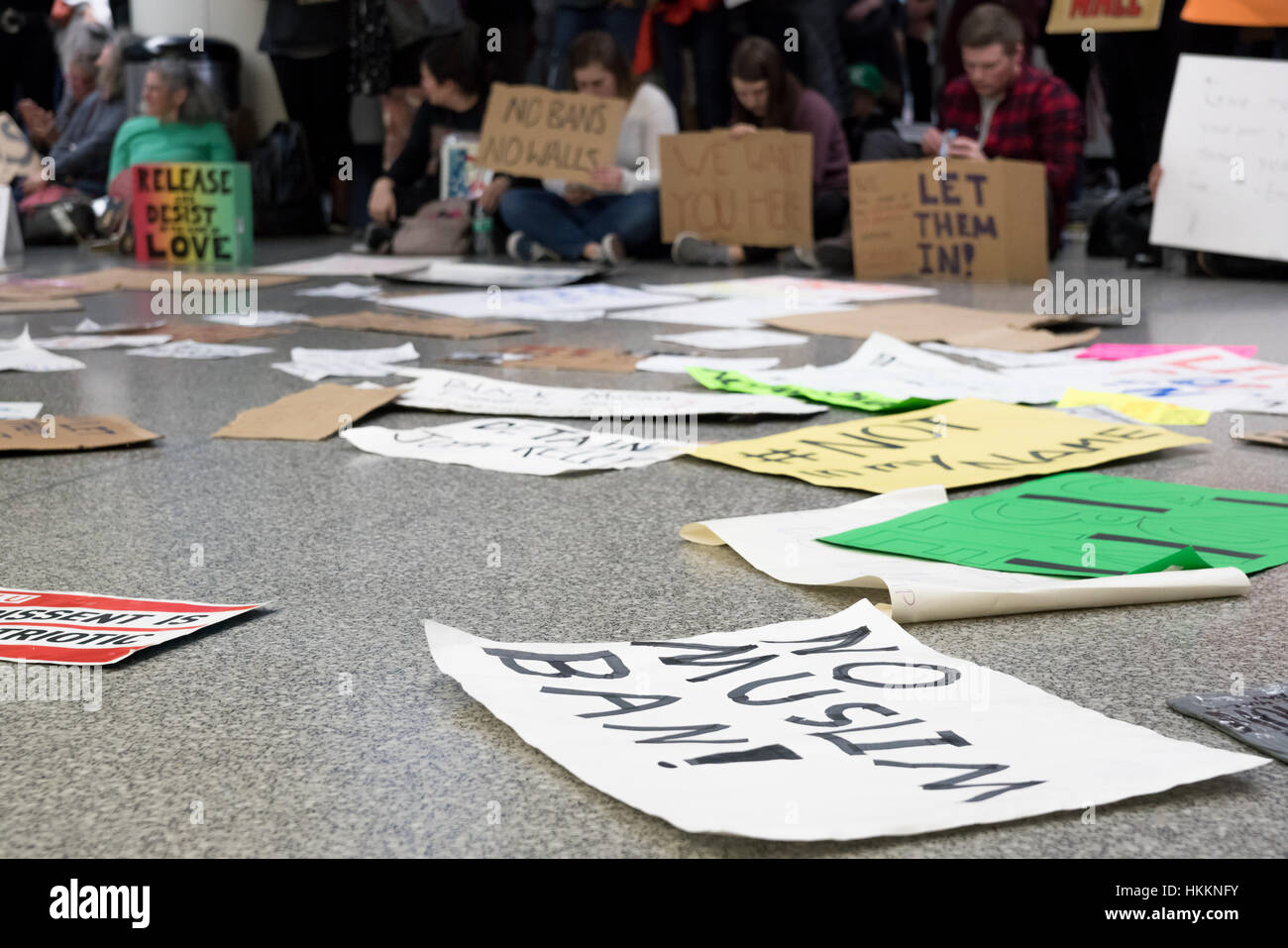 San Francisco, USA. 29th Jan, 2017. Protesters at San Francisco International Airport demand immediate release of refugees detained after Trump’s executive order banning citizens originally from seven Muslim majority countries from entering USA. Credit: Francesco Carucci/Alamy Live News. Stock Photo