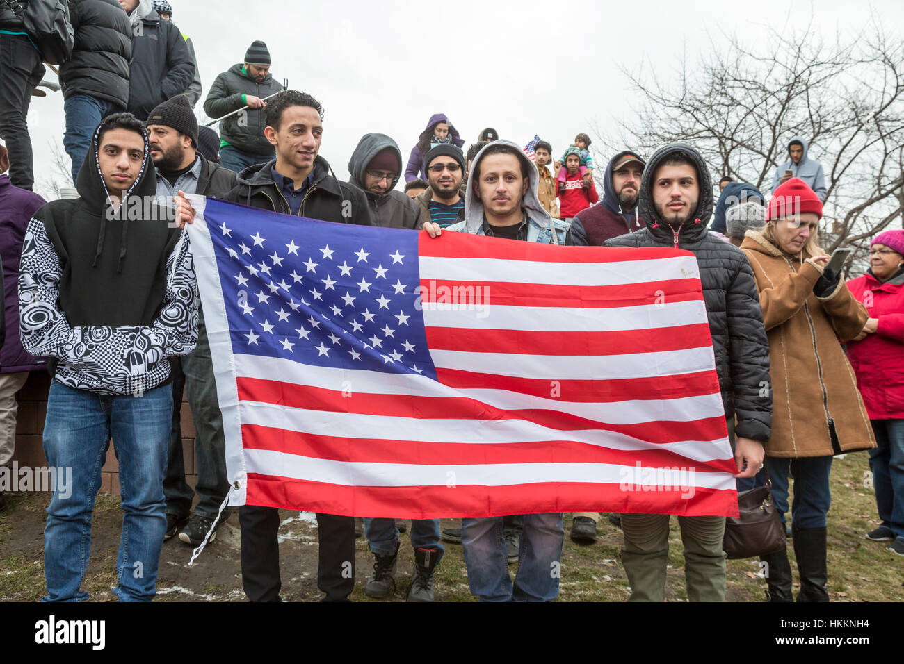 Hamtramck, USA. 29th January, 2017. Hundreds, including these young immigrants from Yemen, rallied at Hamtramck City Hall against President Trump's ban on immigration from seven Muslim nations. Hamtramck is a city of immigrants, a large number of whom are from Yemen. The city is governed by a Muslim-majority city council and is a sanctuary city. Credit: Jim West/Alamy Live News Stock Photo