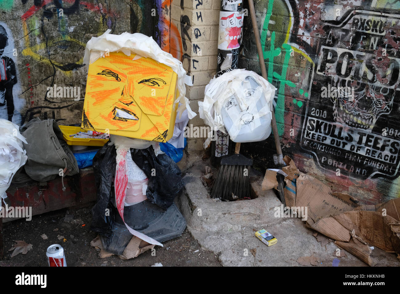 London, UK. 29th January 2017. An artist is making effigies of Theresa May and Donald Trump in Bricklane, London. Credit: ZEN - Zaneta Razaite / Alamy Live News Stock Photo