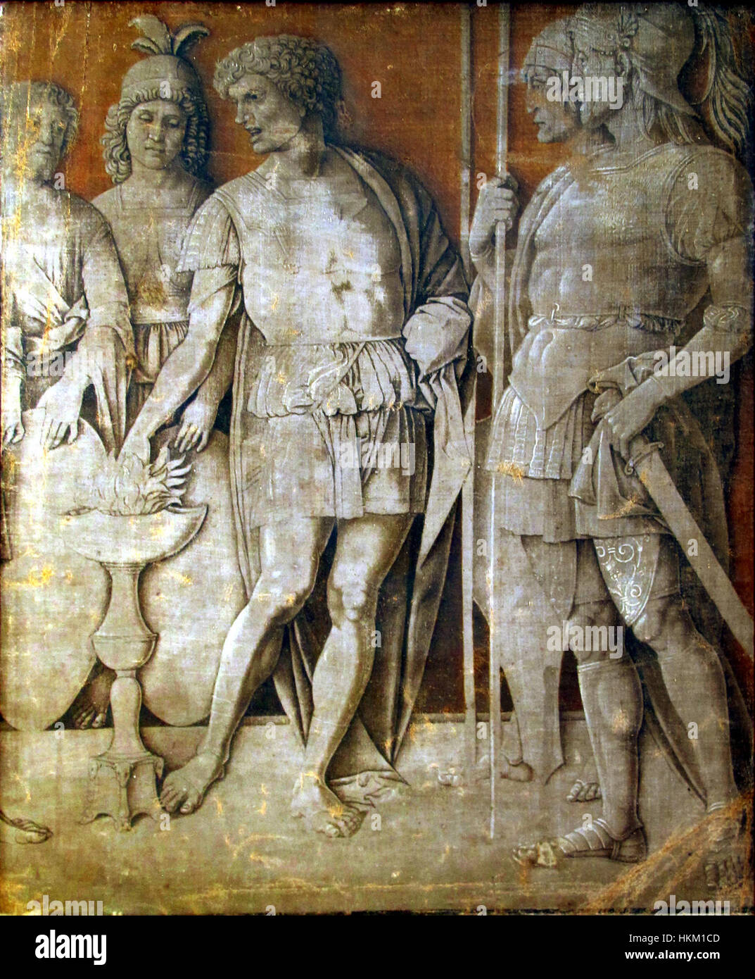 Andrea Mantegna's 'Mucius Scaevola' depicts the legendary Roman figure who famously burned his own hand to demonstrate his bravery. This classical scene showcases Mantegna's detailed approach to perspective and historical narrative. Stock Photo