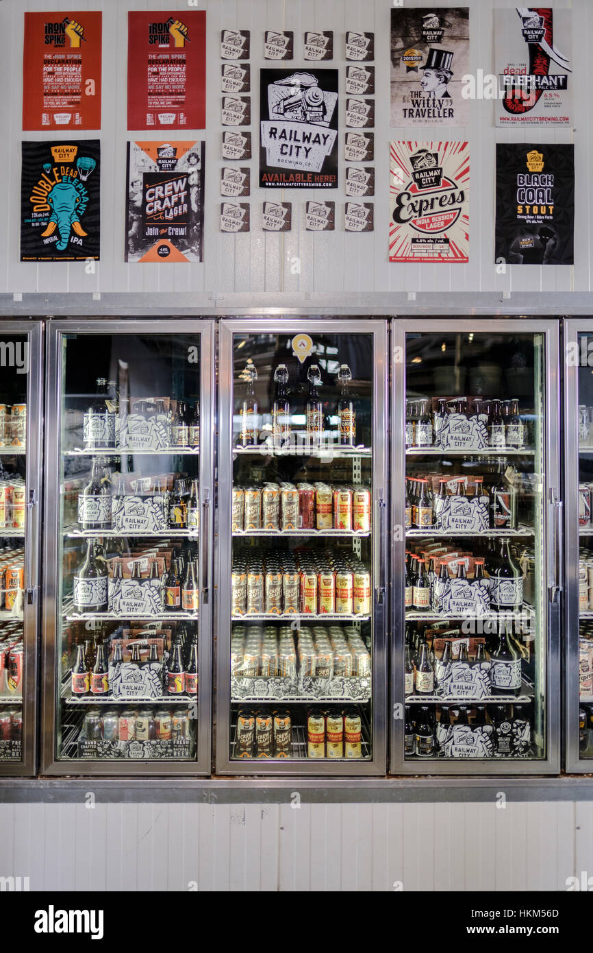 Different kinds of craft beer displayed in a commercial fridge at Railway City Brewing Co., a microbrewery located in St Thomas, Ontario, Canada. Stock Photo