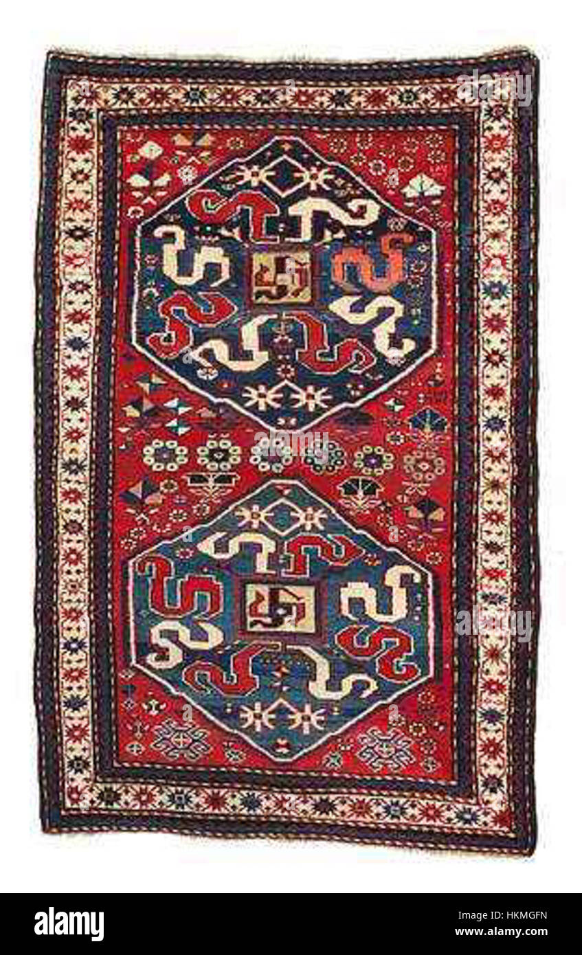 This Armenian Dragon Rug from 1892, measuring 193x122 cm, features intricate patterns typical of the Kazak style. It is an example of the traditional craftsmanship of the Karabagh region, showcasing vibrant colors and symbolic motifs. Stock Photo