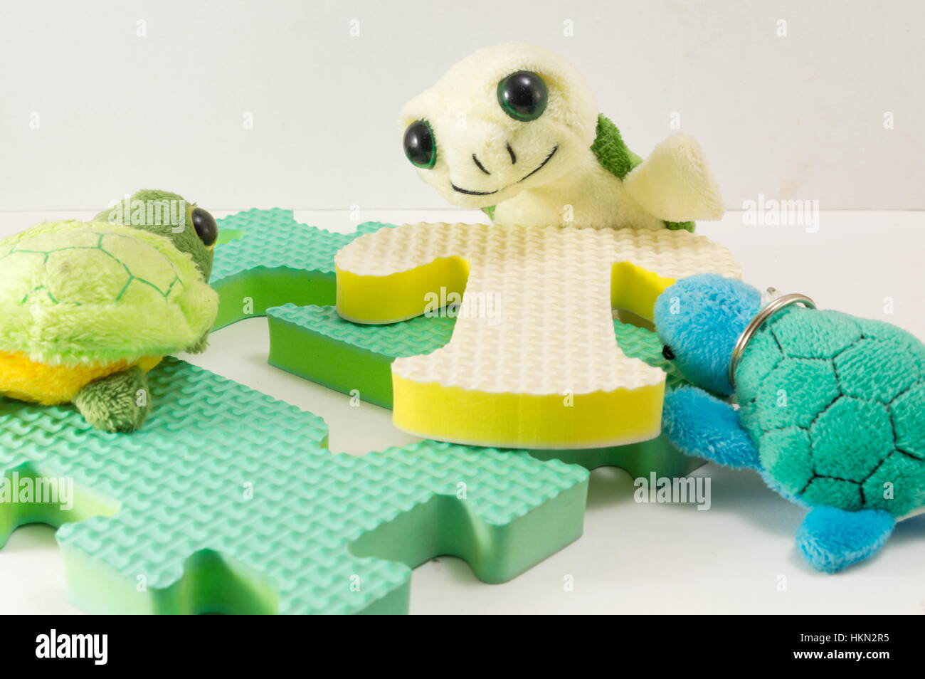 Turtle toy on top of letter T. Fun learning Stock Photo