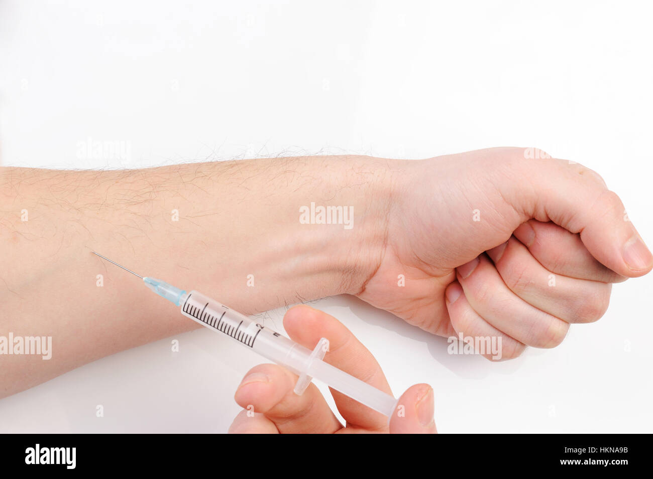 flu Injection on hand on white background Stock Photo