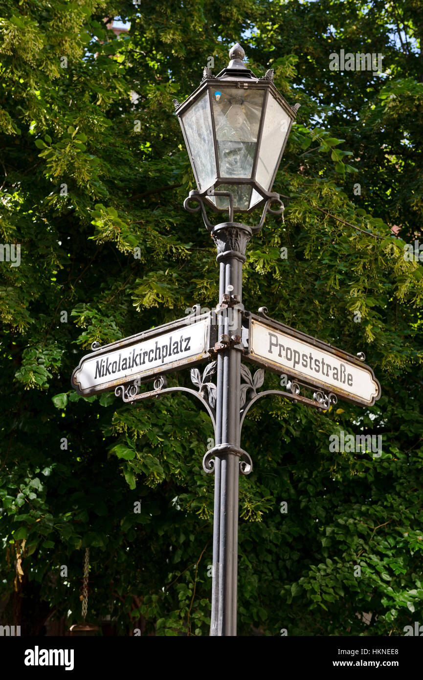 An old lamppost with direction signs in Berlin, Germany Stock Photo - Alamy