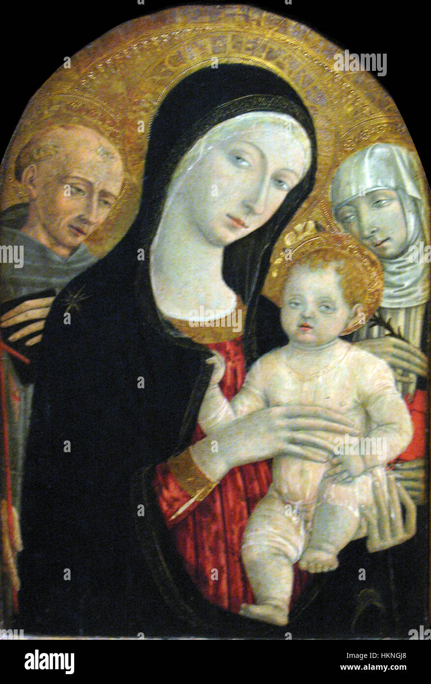 1479 di Giovanni Madonna and child with Saints Francis and Catherine of Siena anagoria Stock Photo