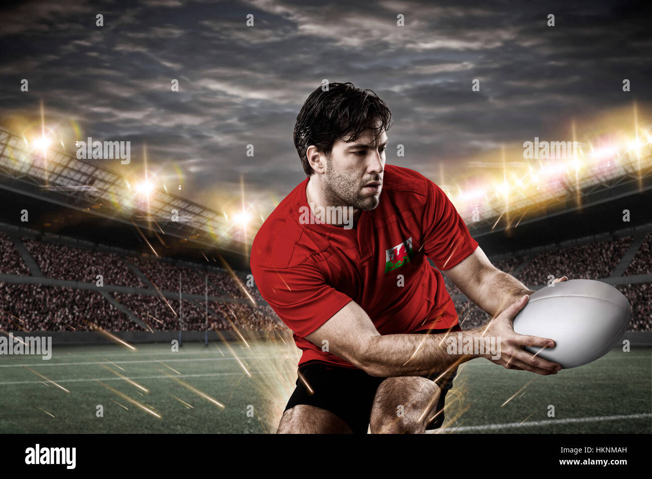 Welsh rugby player, wearing a red uniform in a stadium Stock Photo Alamy
