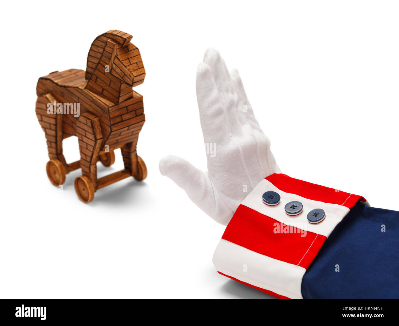 President With Stop Hand to Wooden Trojan Horse Isolated on White. Stock Photo