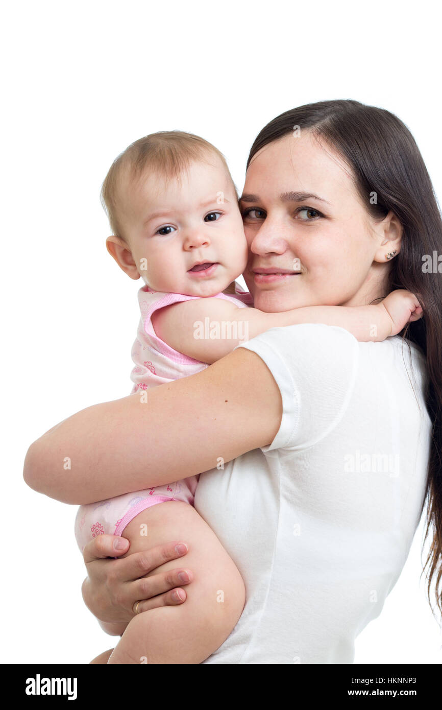 Happy family. A young mother and baby hugging. Stock Photo