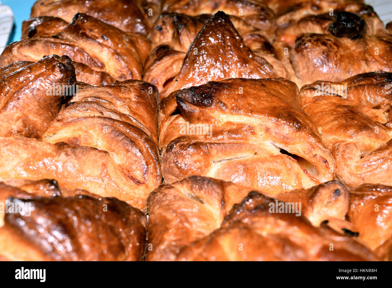 small Sicilian calzoni baked, stuffed with ham cheese tomato olives and