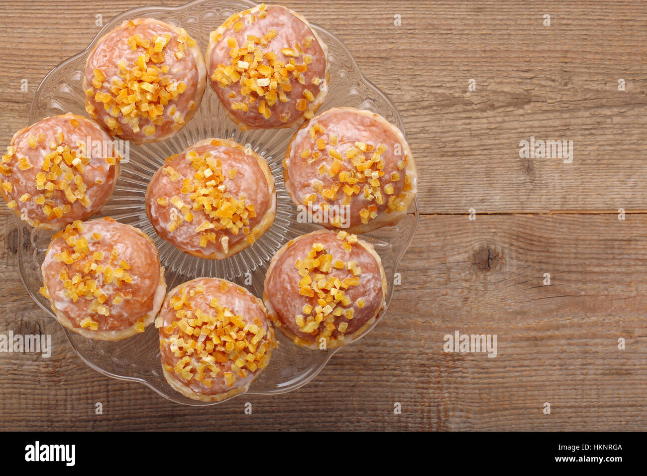 Traditional Polish homemade donuts with rose liqueur and orange and