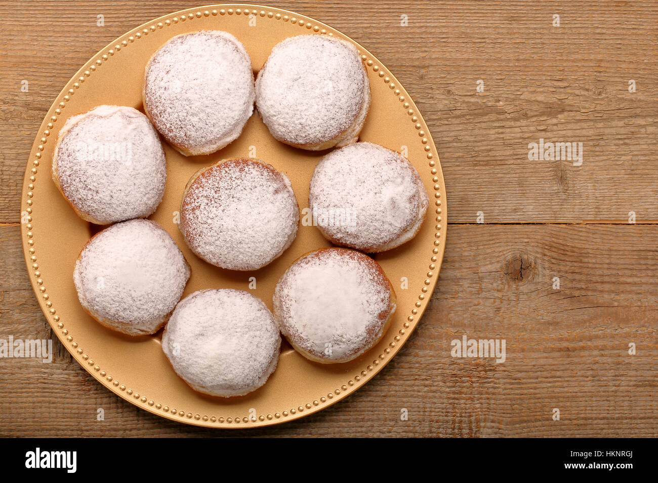 Traditional Polish donuts with liqueur and sugar with empty space for text Stock Photo