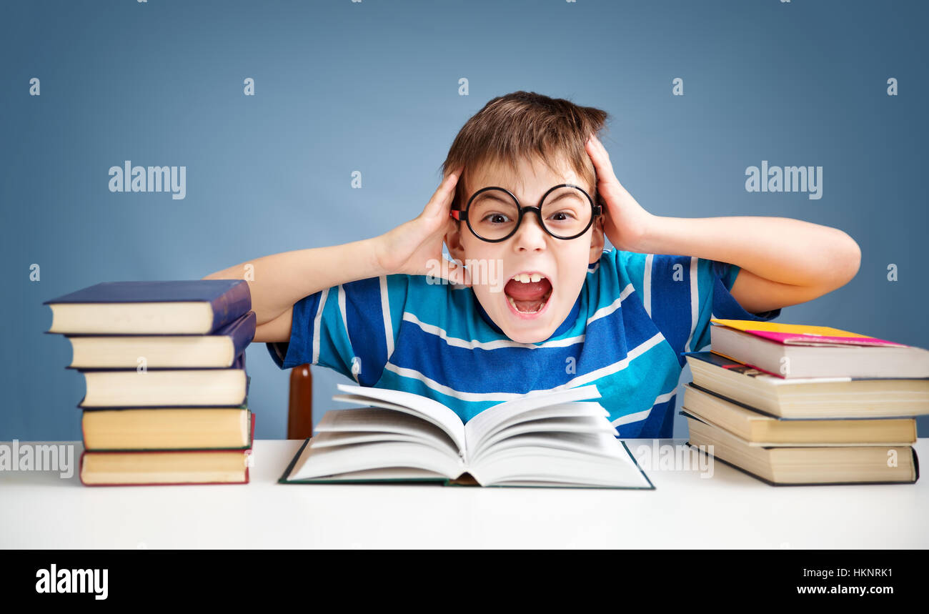 seven years old child reading a book Stock Photo Alamy