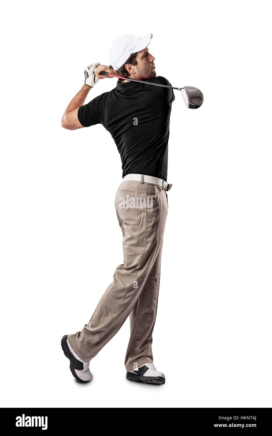 Golf Player in a black shirt taking a swing, on a white Background. Stock Photo