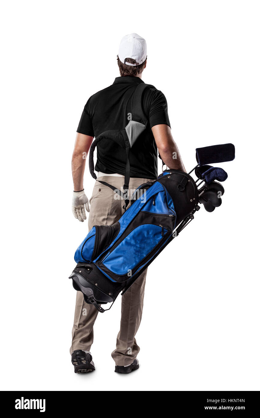 Golf Player in a green shirt walking with a bag of golf clubs on his back, on a white Background. Stock Photo