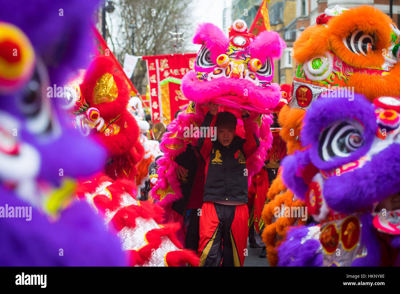 Dancers perform a traditional dragon dance during the Chinese New Year ...