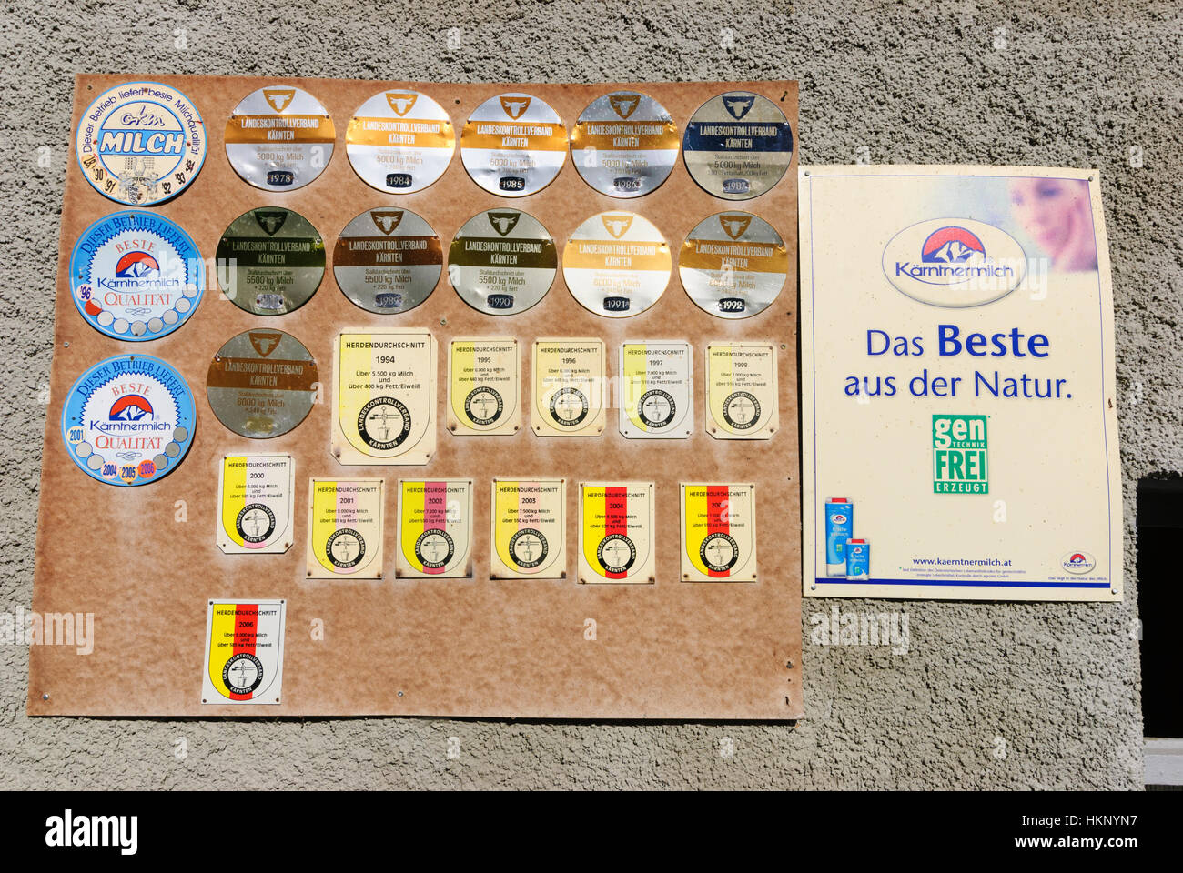 Greifenburg: Quality labels for cow's milk at a cowshed, , Kärnten, Carinthia, Austria Stock Photo
