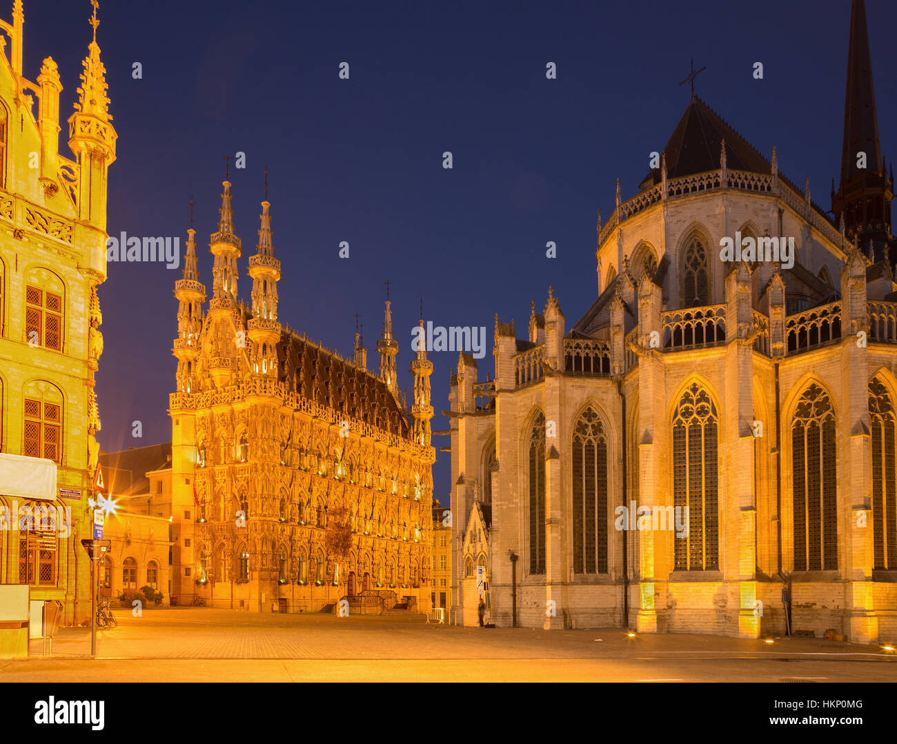 Leuven - Gothic town hall and st. Peters cathedral in evening dusk Stock Photo