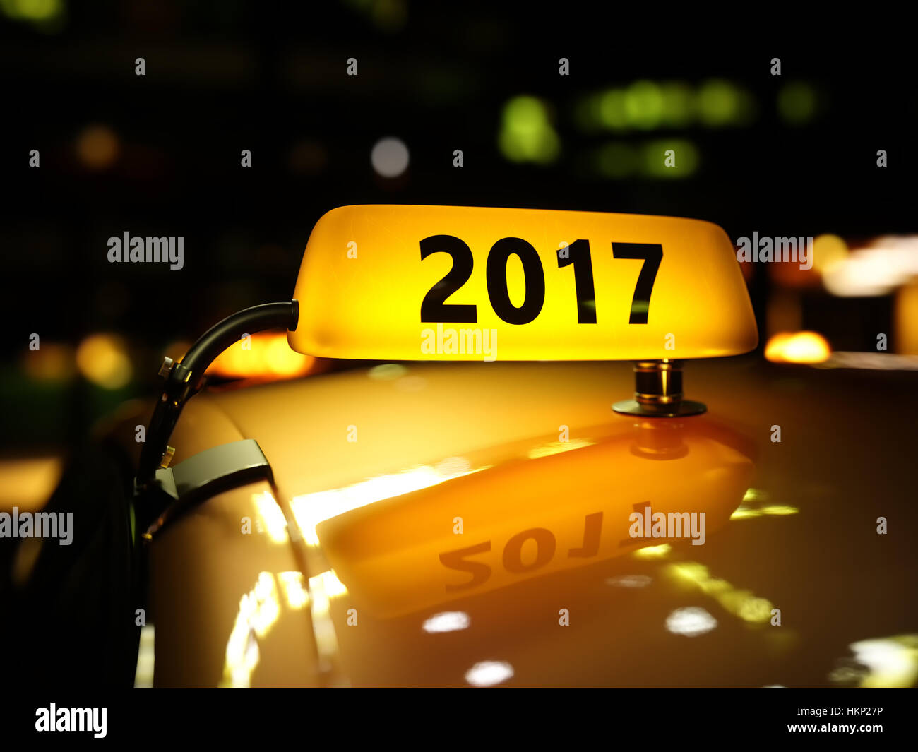 Yellow taxi sign 2017 year at night. Taxi car on the street at night. Taxi car new 2017 year roof sign on bokeh background Stock Photo