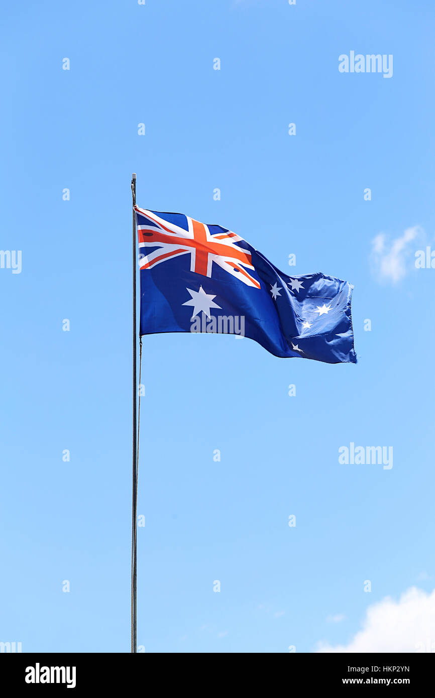 Australian flag flying on a flagpole Stock Photo Alamy