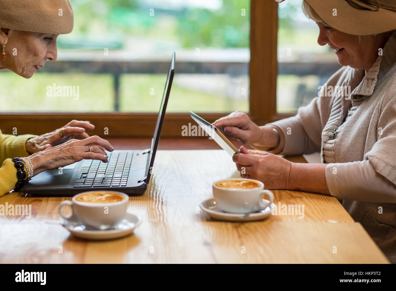 Women with modern gadgets Stock Photo - Alamy